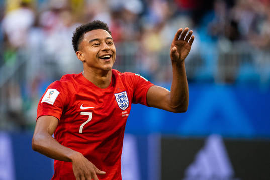 Jesse Lingard of England celebrates