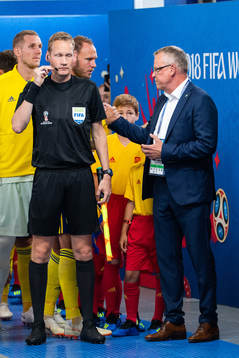 Andreas Granqvist ann head coach Janne Andersson of Sweden