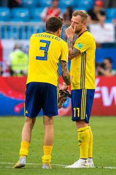 John Guidetti and Victor Nilsson Lindelöf of Sweden looks