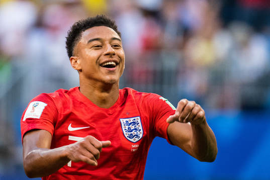 Jesse Lingard of England celebrates