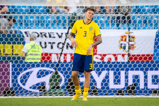Victor Nilsson Lindelöf of Sweden looks dejected