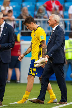 Victor Nilsson Lindelöf of Sweden looks dejected