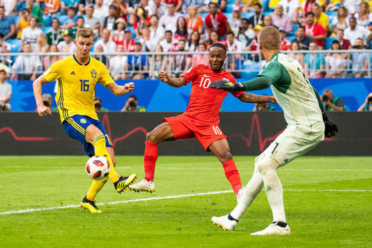 Raheem Sterling of England with an attempt against Emil