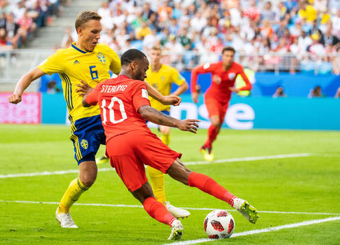 Ludwig Augustinsson of Sweden and Raheem Sterling of