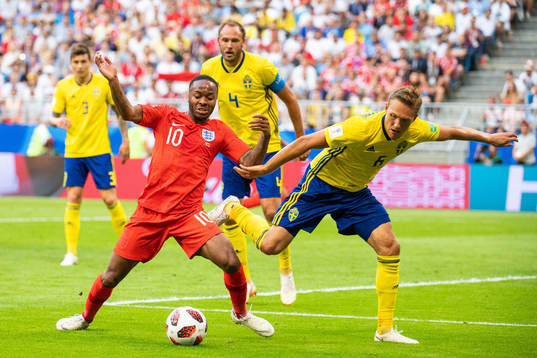 Ludwig Augustinsson of Sweden and Raheem Sterling of