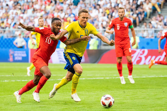 Ludwig Augustinsson of Sweden and Raheem Sterling of
