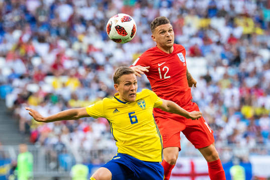 Ludwig Augustinsson of Sweden and Kieran Trippier of
