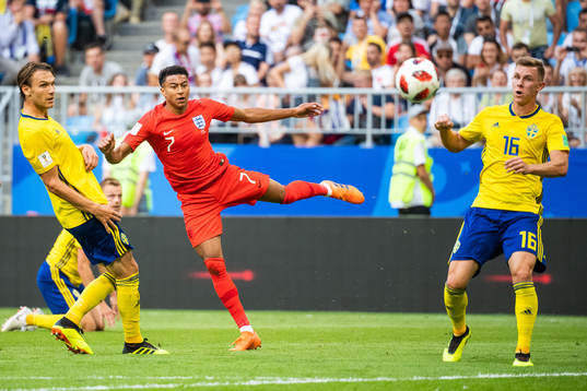 Albin Ekdal of Sweden sees Jesse Lingard of England shoot