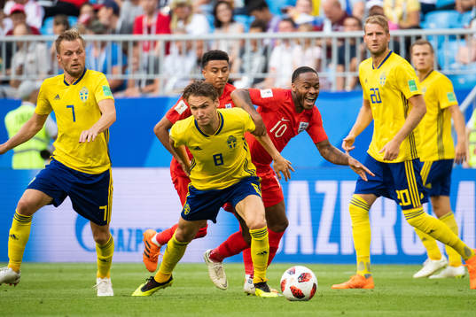 Albin Ekdal of Sweden and Raheem Sterling of England
