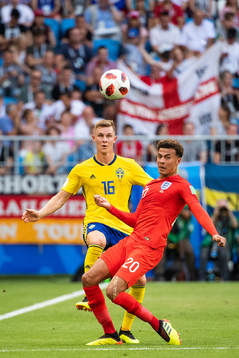 Emil Krafth of Sweden and Dele Alli of England