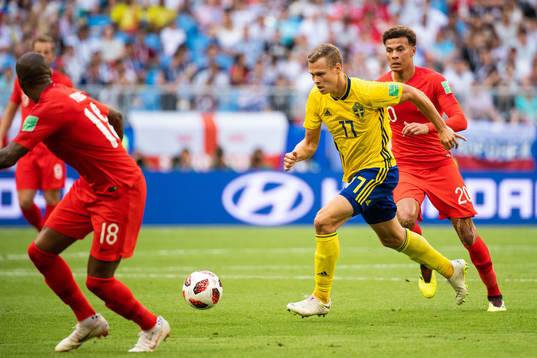 Viktor Claesson of Sweden and Dele Alli of England