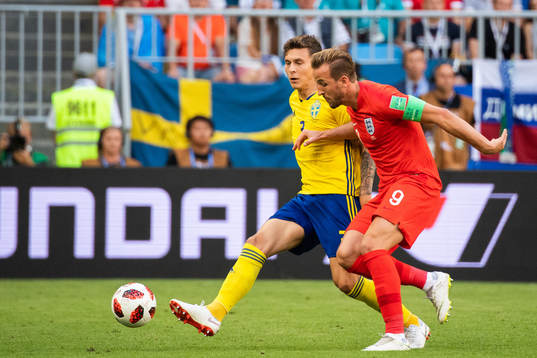 Victor Nilsson Lindelöf of Sweden adn Harry Kane of