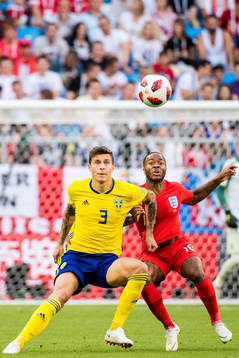 Victor Nilsson Lindelöf of Sweden and Raheem Sterling of