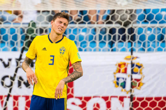 Victor Nilsson Lindelöf of Sweden looks dejected