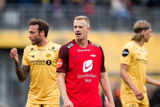 José Ángel of Bodø/Glimt and Peter Orry Larsen of Brann