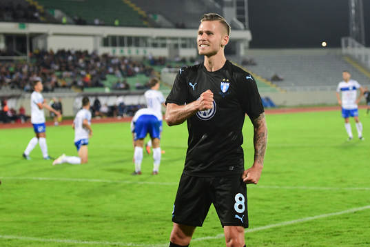 Arnór Ingvi Traustason of Malmö FF celebrates scoring 0-2