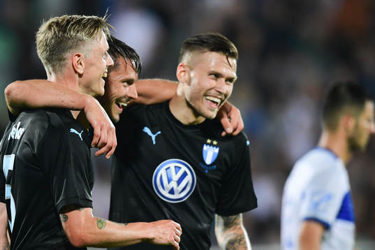 Sören Rieks celebrates with Markus Rosenberg and Arnór