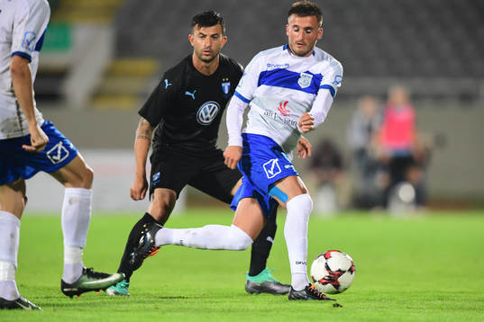 Behrang Safari of Malmö FF and Endrit Krasniqi of Drita