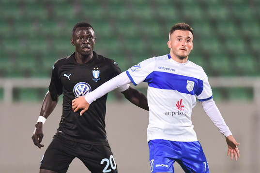 Bonke Innocent of Malmö FF and Endrit Krasniqi of Drita