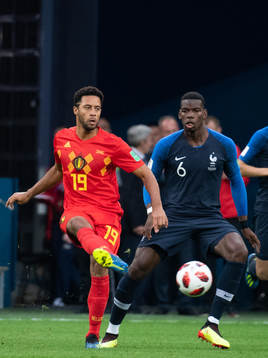 Moussa Dembele of Belgium and Paul Pogba of France competes