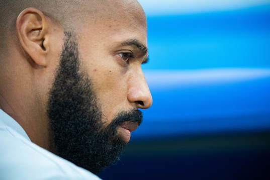 Assisting coach Thierry Henry of Belgium prior to the FIFA