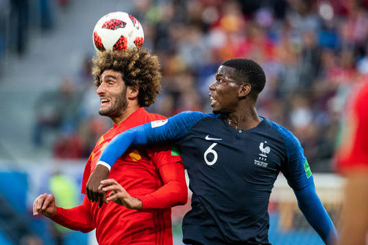 Marouane Fellaini of Belgium and Paul Pogba of France