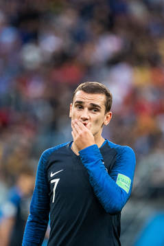 Antoine Griezmann of France looks dejected