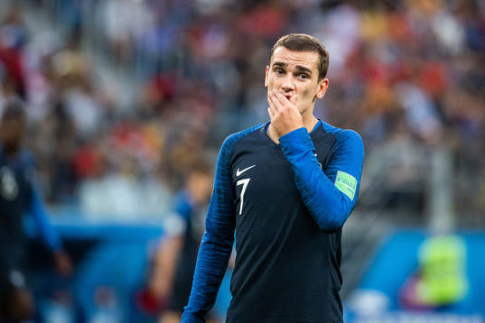Antoine Griezmann of France looks dejected