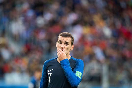 Antoine Griezmann of France looks dejected
