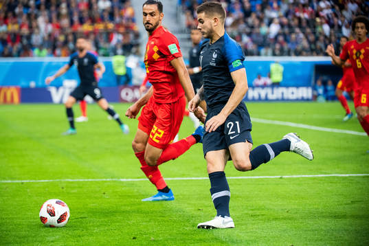 Lucas Hernandez of France and Nacer Chadli of Belgium