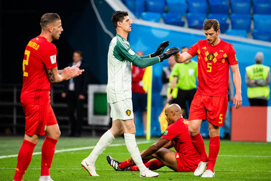 goalkeeper Thibaut Courtoisof Belgium celebrates with Jan