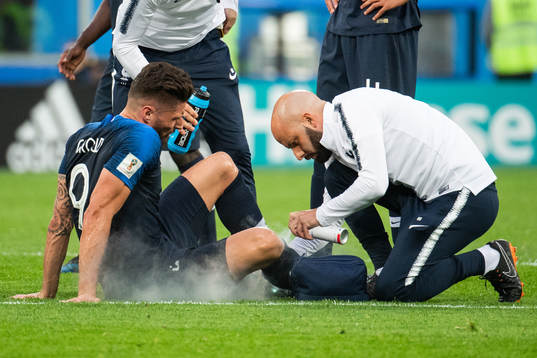 Olivier Giroud of France receives treatment