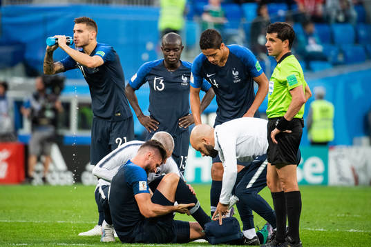 Olivier Giroud of France receives treatment