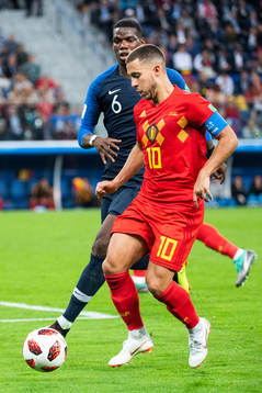 Eden Hazard of Belgium and Paul Pogba of France