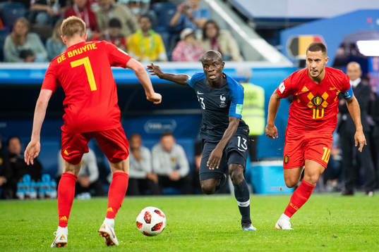 Eden Hazard of Belgium chases Ngolo Kante of France