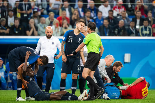Lucas Hernandez of France talks to referee Andres Cunha