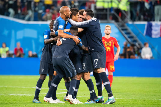 Players of France celebrate