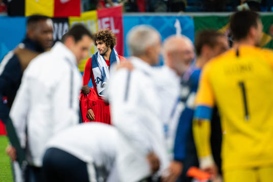 Marouane Fellaini of Belgium looks dejected
