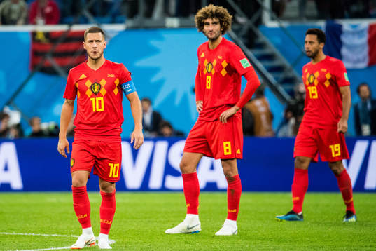 Eden Hazard and Marouane Fellaini of Belgium looks dejected