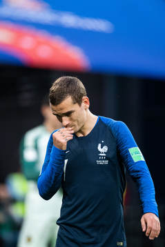 Antoine Griezmann of France looks dejected