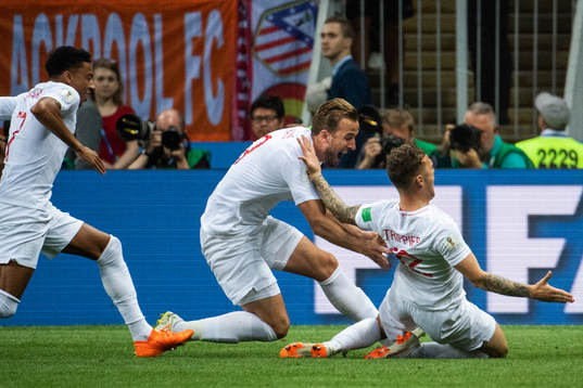 Kieran Trippier of England celebrate with Harry Kane