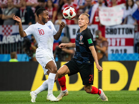 Raheem Sterling of England and Domagoj Vida of Croatia