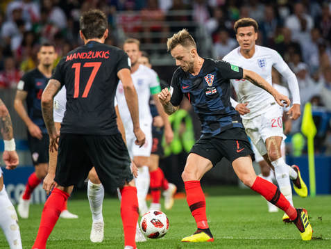 Ivan Rakitic of Croatia competes for the ball