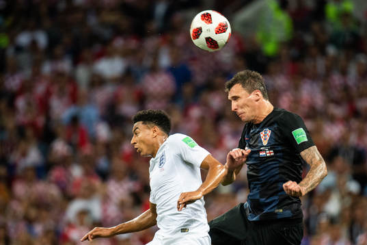 Jesse Lingard of England and Mario Mandzukic of Croatia
