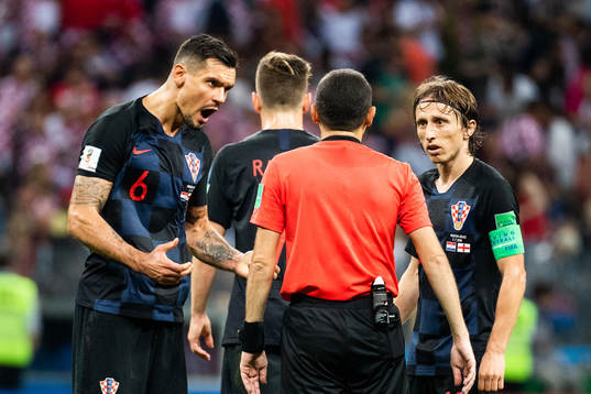 Dejan Lovren and Luka Modric of Croatia in a discussion