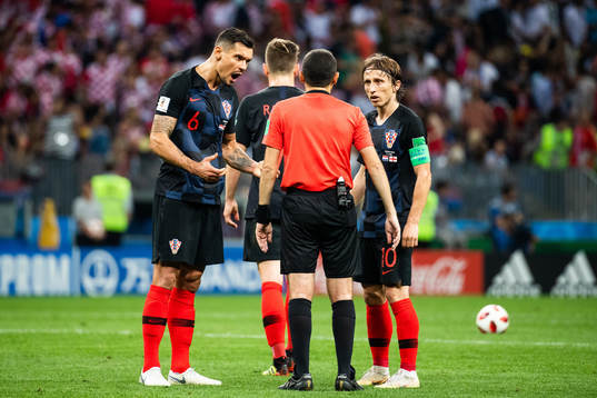 Dejan Lovren and Luka Modric of Croatia in a discussion