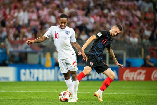 Raheem Sterling of England and Marcelo Brozovic of Croatia