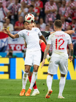 Jesse Lingard of England and Ivan Strinic of Croatia