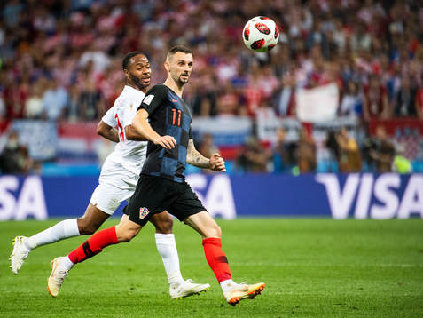 Raheem Sterling of England and Marcelo Brozovic of Croatia