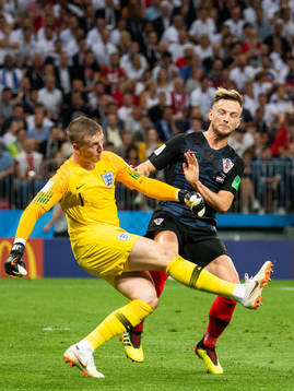 goalkeeper Jordan Pickford of England and Ivan Rakitic of